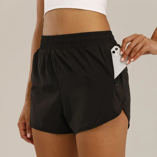 Short femme sport léger running fitness été coupe slim poches - Wellness Fusion